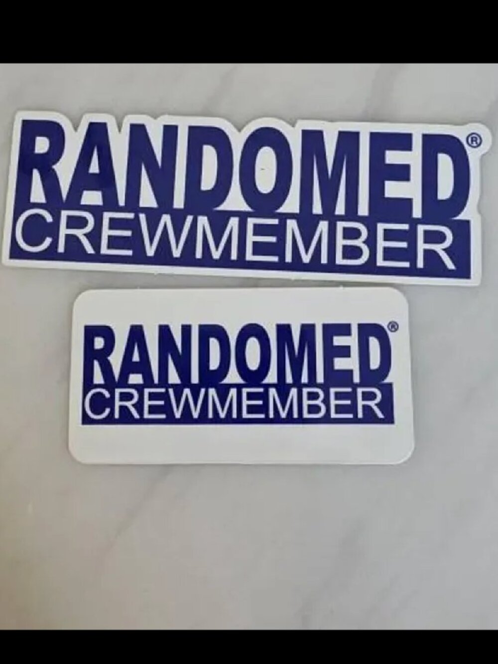 Randomed Crew stickers and lanyard